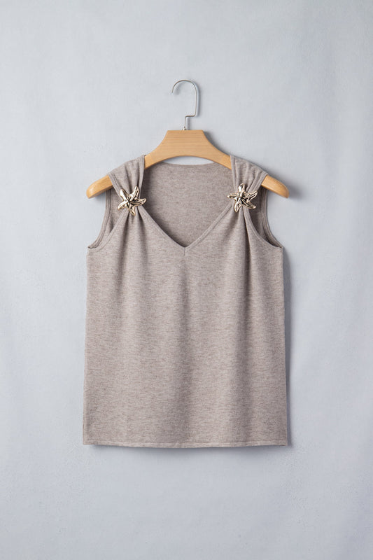 Gebreide tanktop met V-hals en metalen zeesterren
