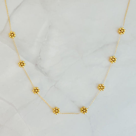 Verfijnde gouden kralen bloemenketting