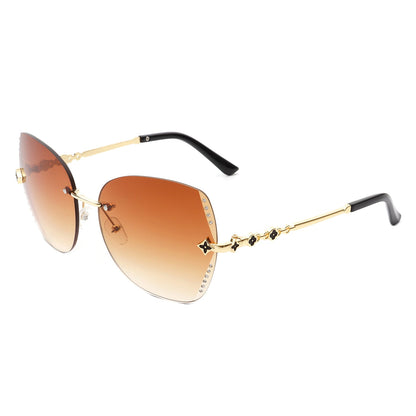 Kineticx - Oversize Randloze Vlindervorm Getinte Strass Mode