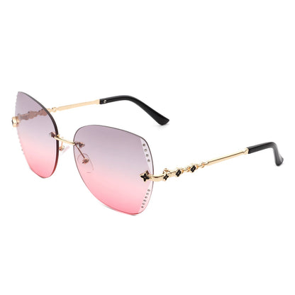 Kineticx - Oversize Randloze Vlindervorm Getinte Strass Mode