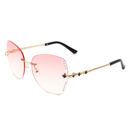 Kineticx - Oversize Randloze Vlindervorm Getinte Strass Mode